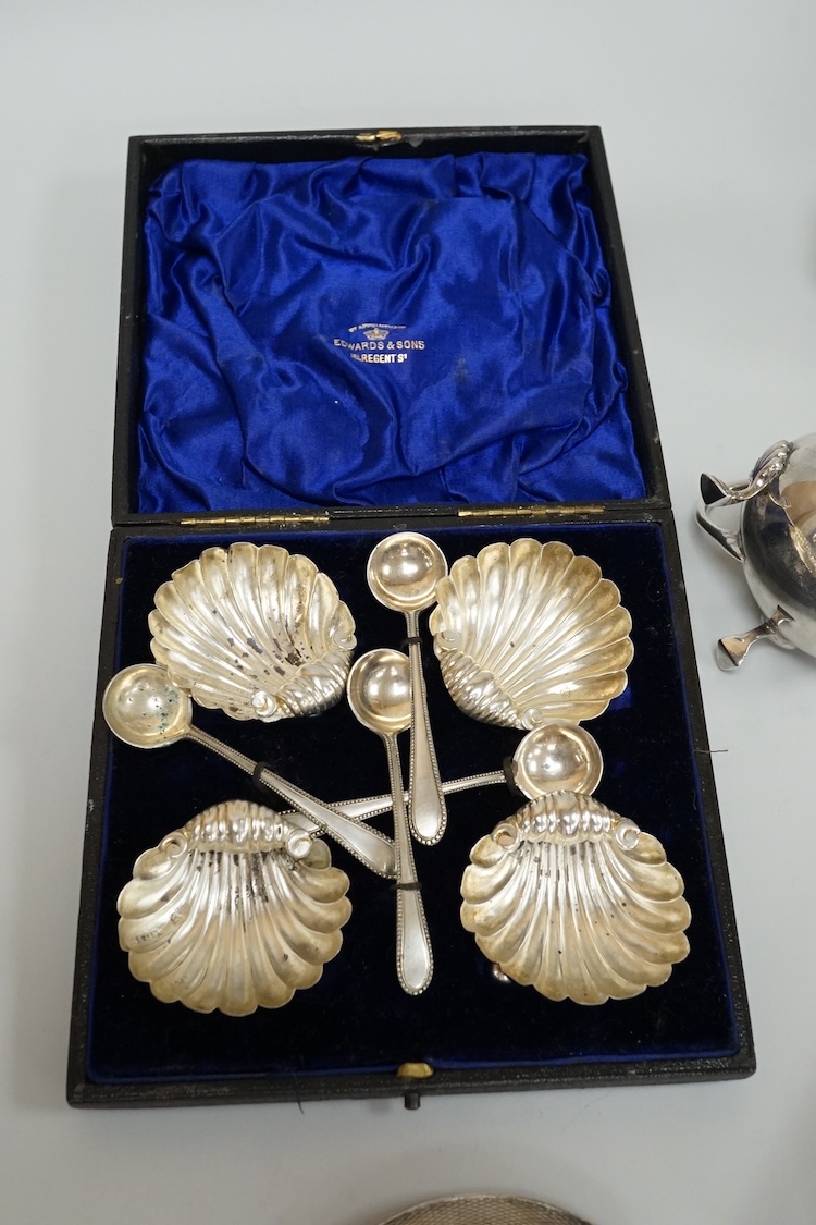 A group of small silver to include a cased modern silver butter shell and knife by Francis Howard Ltd, Sheffield, 1988, a cased set of four late Victorian silver shell salts with four associated plated spoons, a late 196